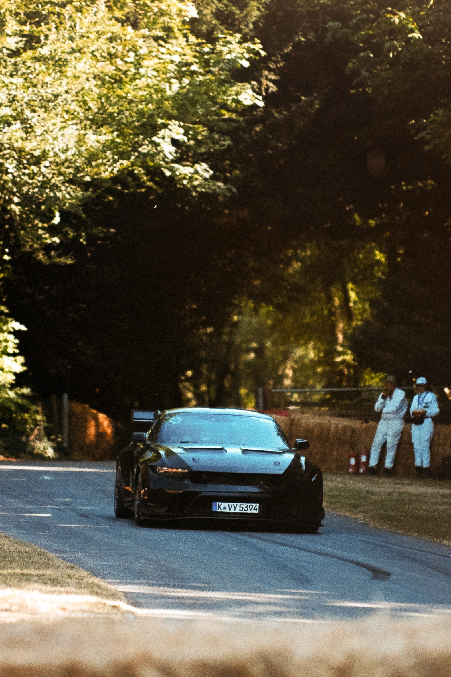 I shot a few images of the Mustang GTD the previous day, but this image is a bit calmer, with the sunlight coming through trees. It was captured after the hillclimb finish line. You can see the marshals appear more relaxed – like everyone’s taking a satisfied exhale after the madness of the hillclimb. License valid for earned editorial, press releases, press kits. All non-broadcast digital and online media Region: Global. This content is solely for editorial use and for providing individual users with information. Any storage in databases, or any distribution to third parties within the scope of commercial use, or for commercial use is permitted with written consent from Ford in Europe GmbH only.